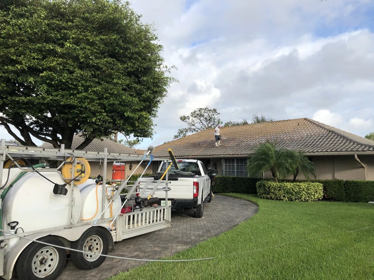 Soft-wash roof cleaning - flat tile roof, Atlantis, FL