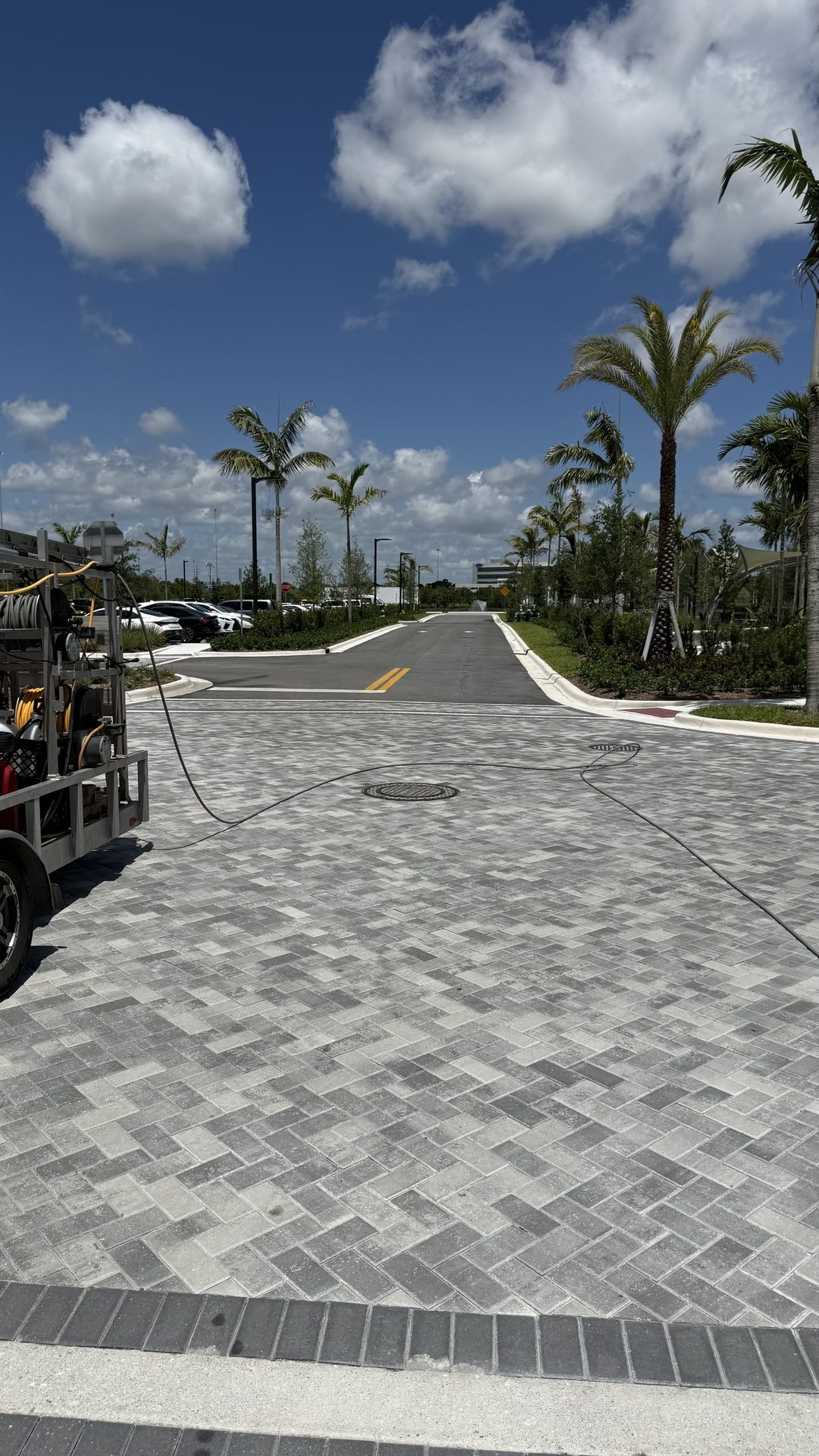 Cleaned paver service drive at a medical center, Palm Beach Gardens, FL