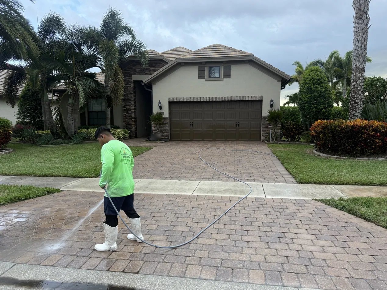 After: Brick paver driveway pressure washing - Wellington, FL — after service