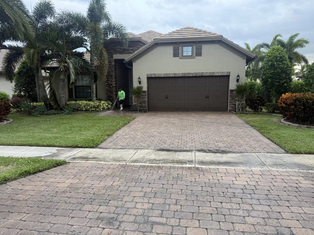 Before: Brick paver driveway pressure washing - Wellington, FL — before service