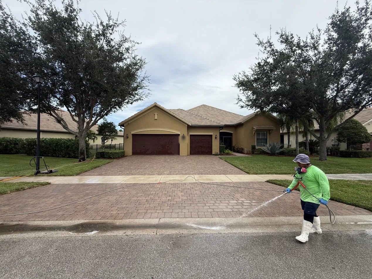 After: Paver driveway pressure washing and rinse-down - Wellington, FL — after service