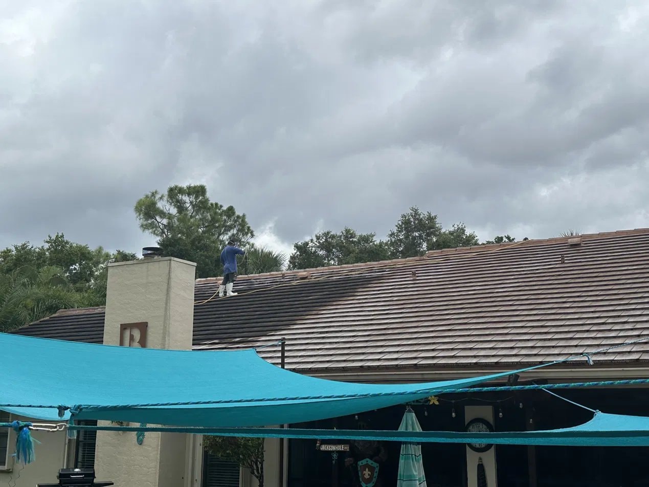 Soft-wash roof cleaning - flat tile roof, Lake Worth, FL