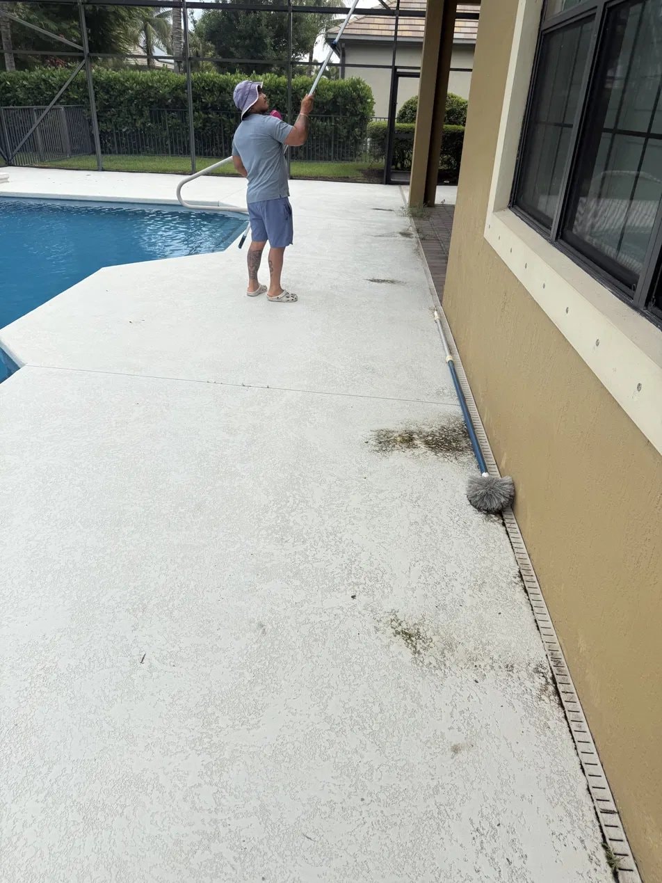 Before: Pool deck pressure washing and screen enclosure cleaning - Wellington, FL — before service