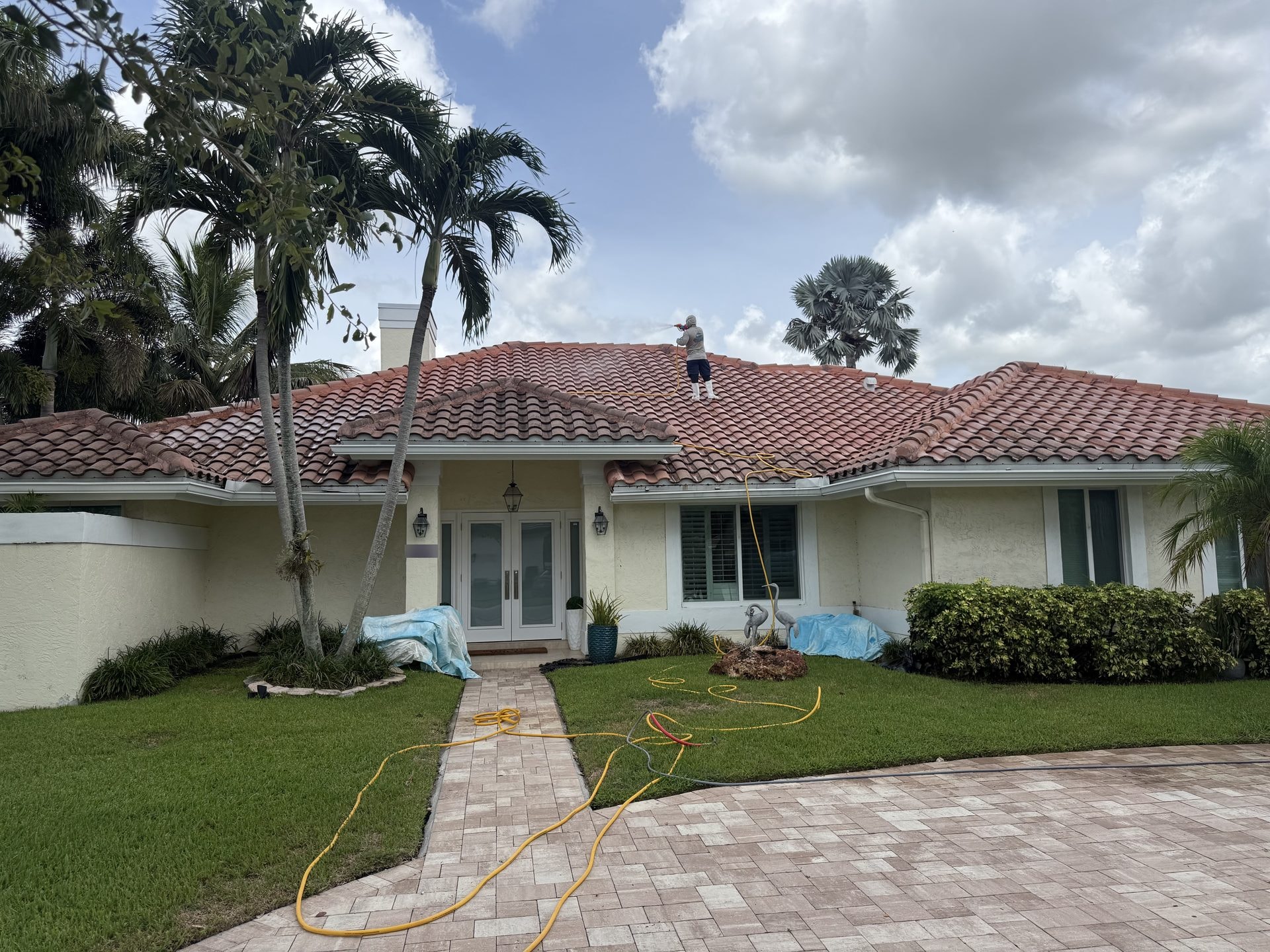 Tile roof with heavy algae staining before soft-wash cleaning, Boca Raton, FL