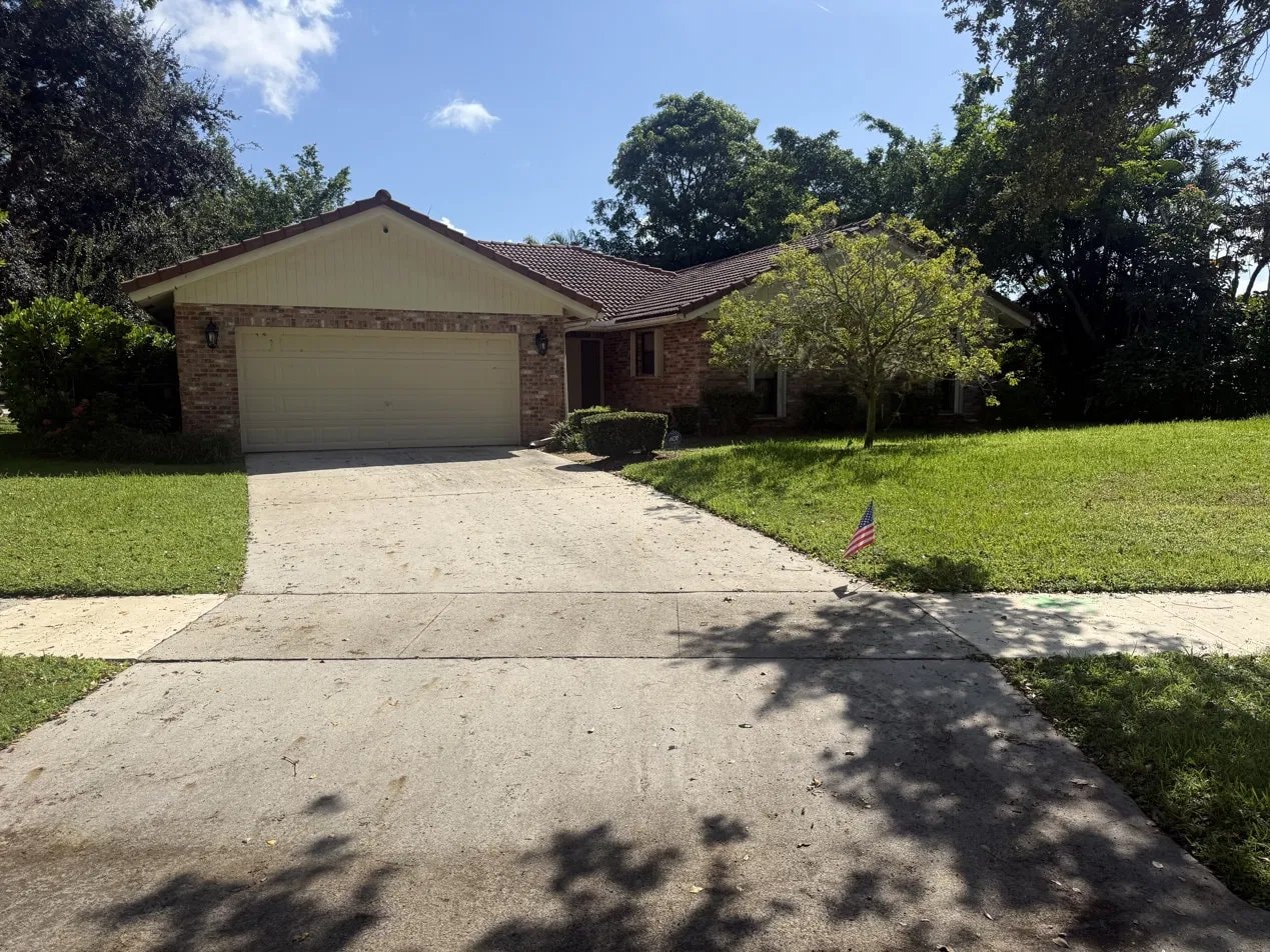 Before: Soft-wash roof cleaning and driveway pressure washing - barrel tile roof, Boca Raton, FL — before treatment