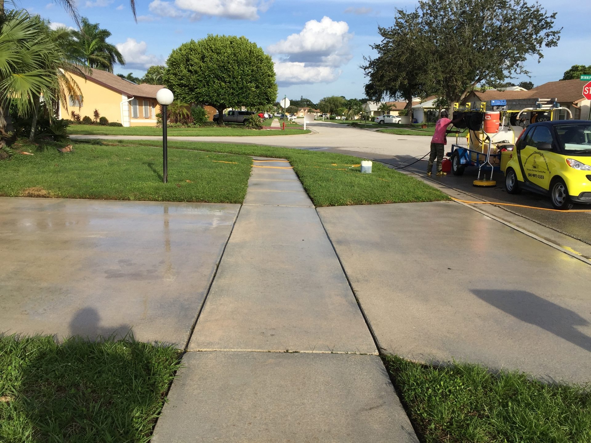 The same sidewalk after pressure cleaning, Greenacres, FL