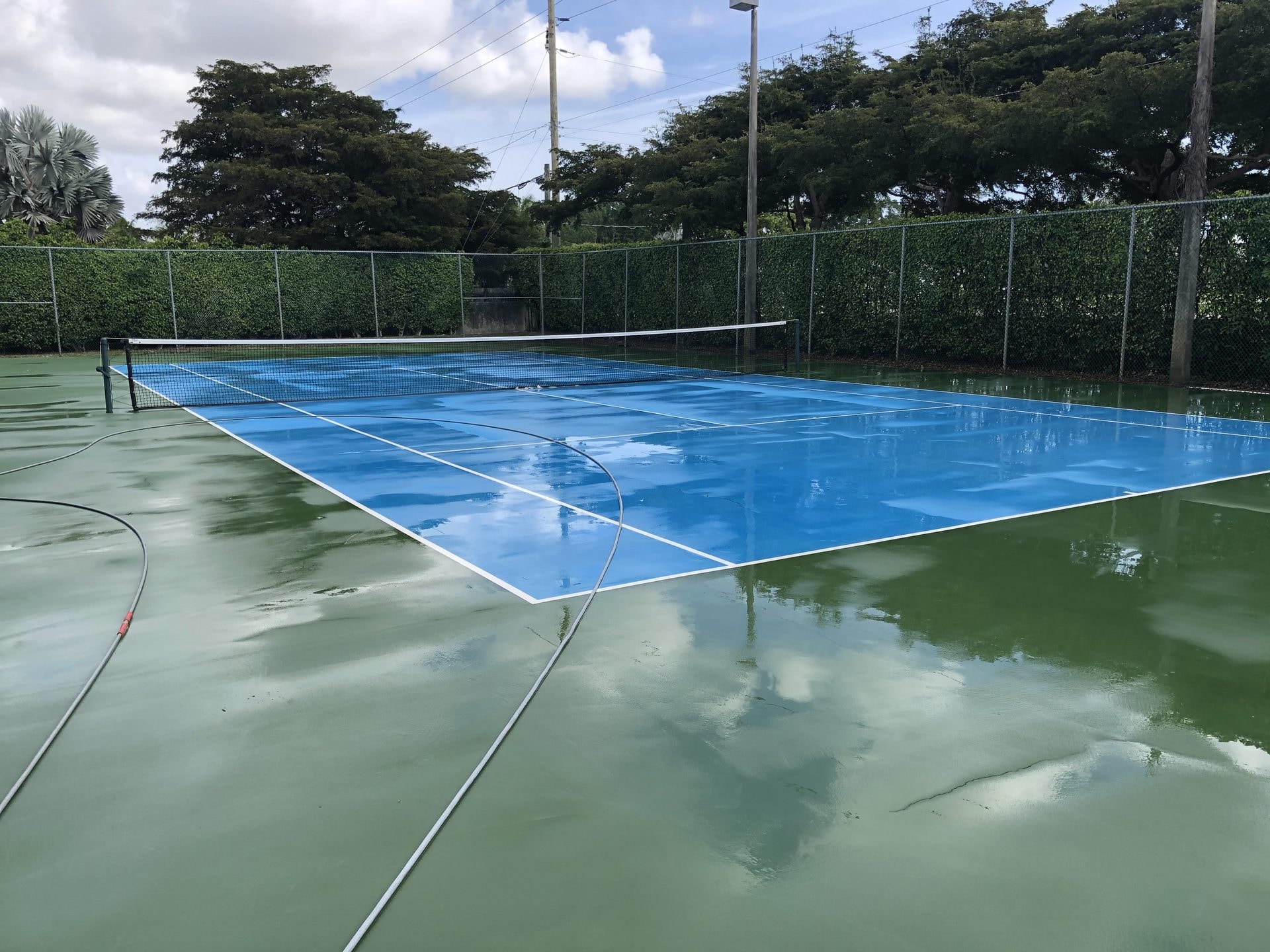 Tennis court soft washing in Delray Beach, FL