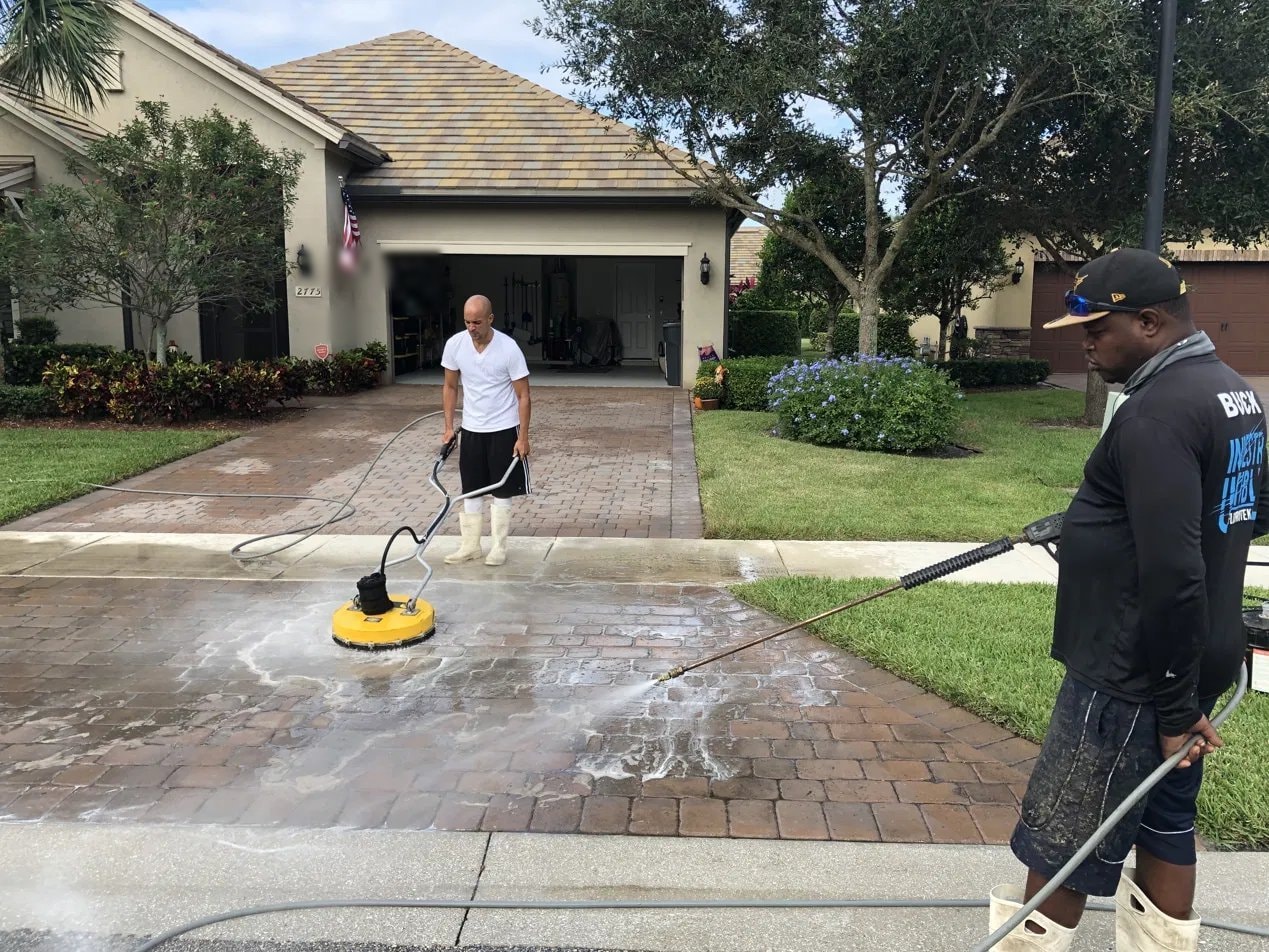 Before: Paver driveway pressure washing and sealing - Wellington, FL — before service