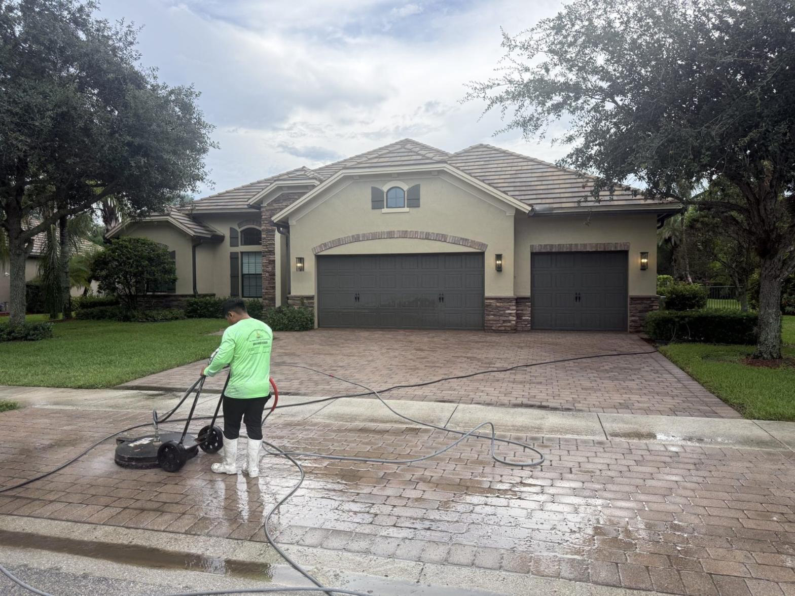 Before: Brick paver driveway in Wellington, FL before pressure washing