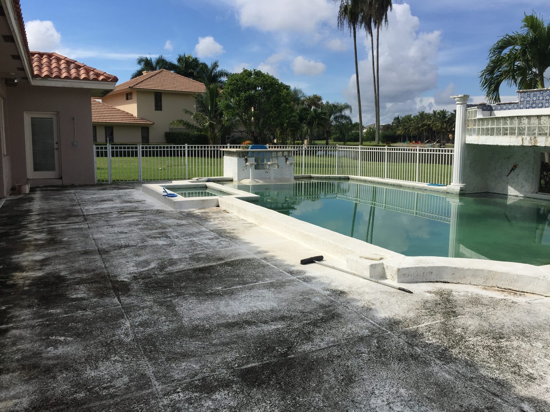 Pool deck in Wellington, FL before pressure cleaning