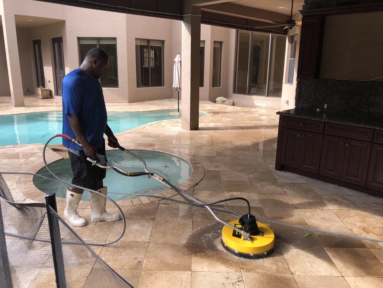 Travertine pool deck pressure washing - Wellington, FL